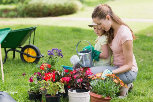 Training session with gardeners learning safe tool use